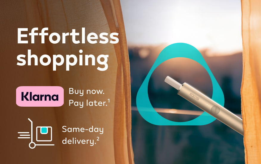IQOS device with a TEREA stick inside by curtains. 